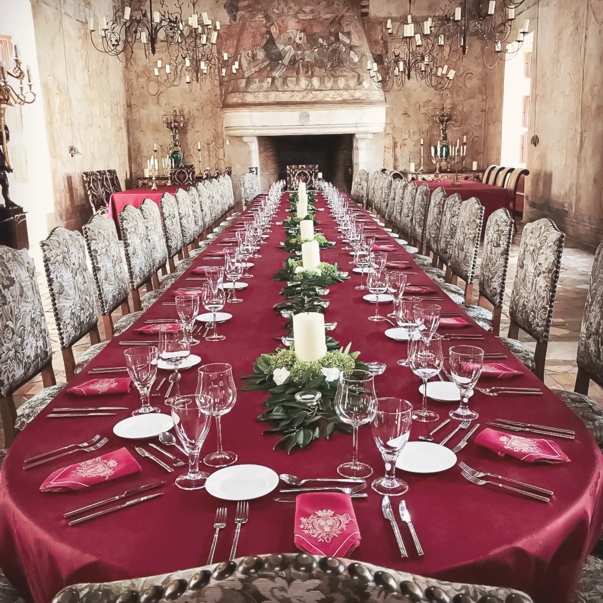 The Salon des Rois, the long table under the frescoed chimney